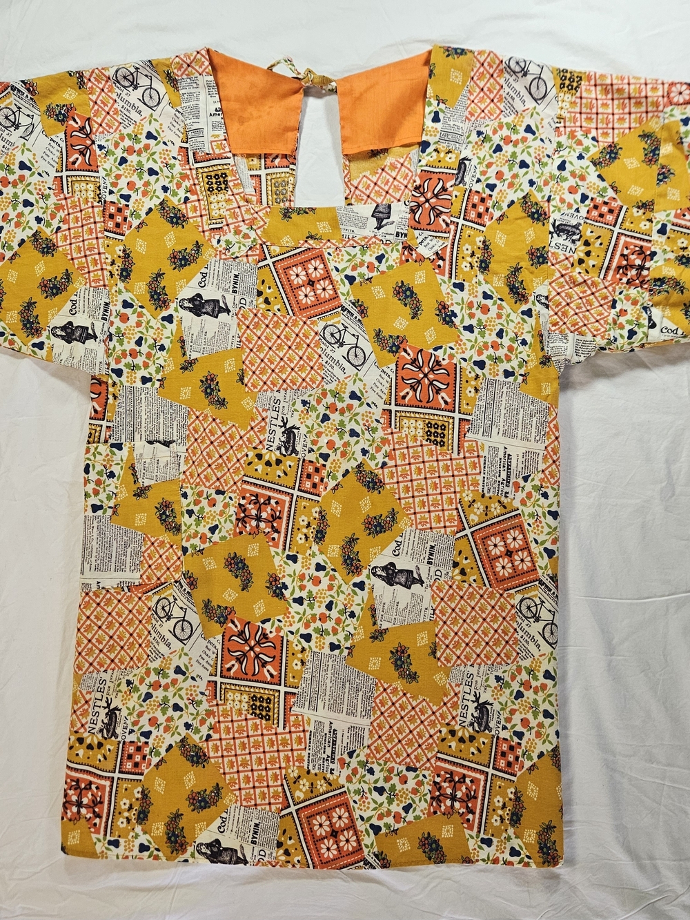 Women's 70s Patchwork Newspaper Print Tunic Top Apron Jacket in Mustard & Orange - Picture 1 of 14